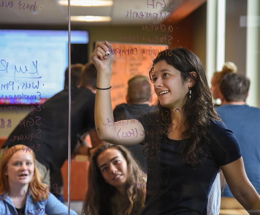 A group of students walking on campus at Susquehanna University.
